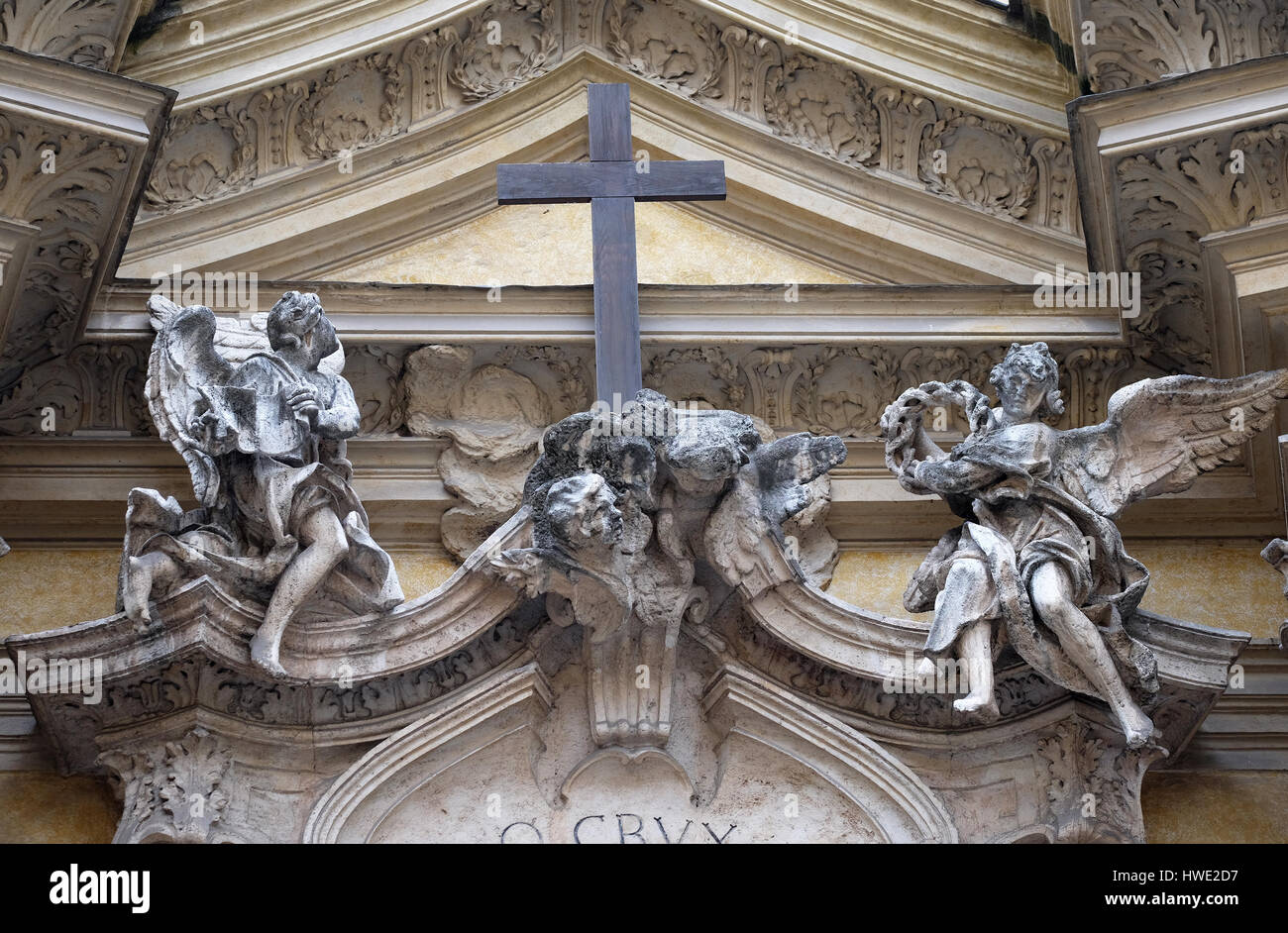 Angels and cross, facade of Santa Maria Maddalena Church in Rome, Italy ...