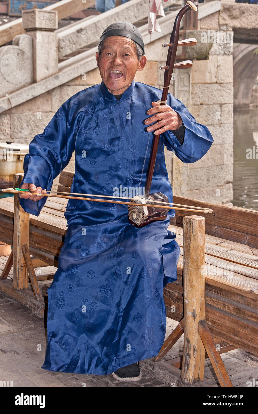 Chinaman Playing Erhu Xitang China Stock Photo