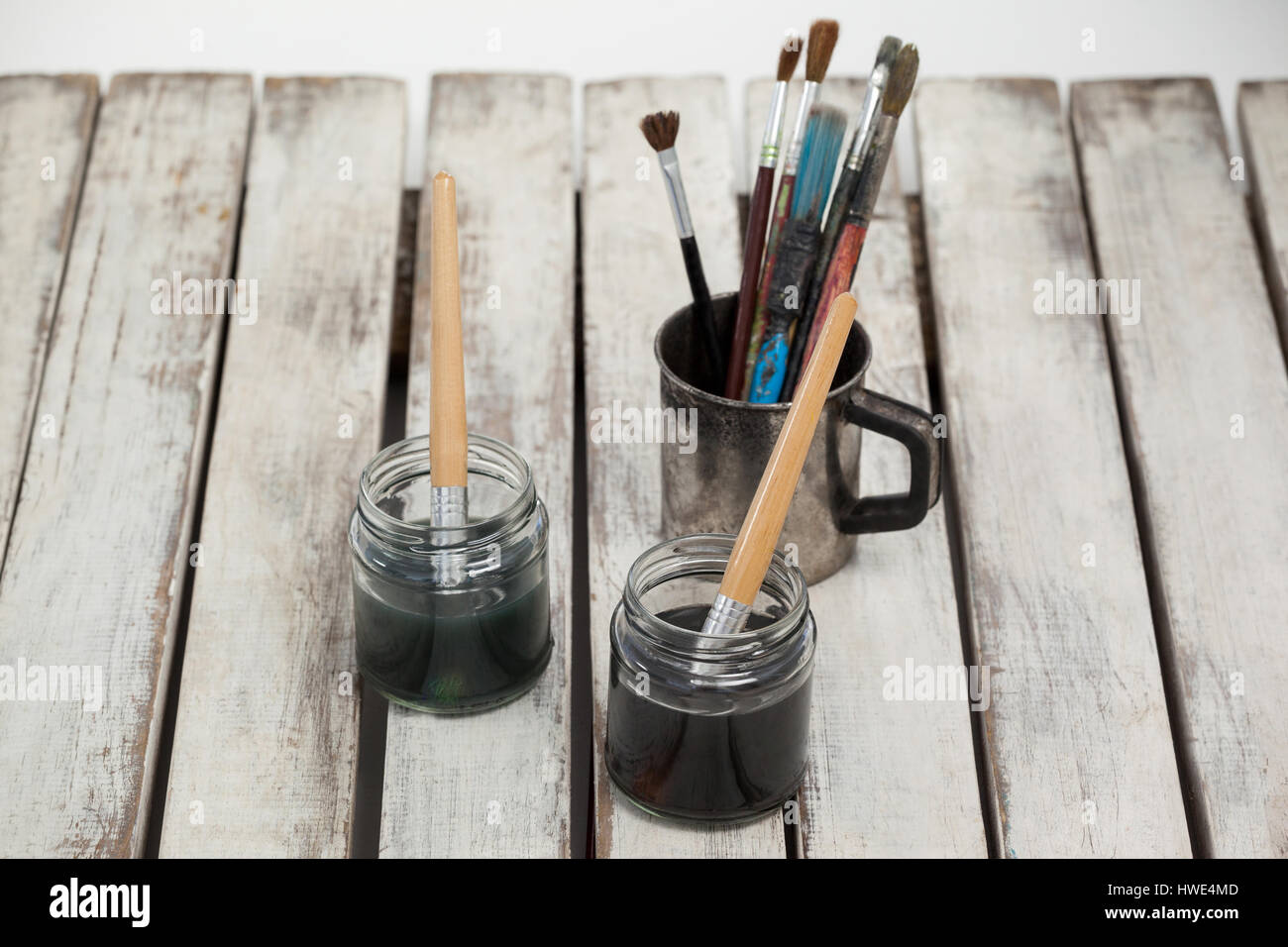 Cup water paint brush hi-res stock photography and images - Alamy