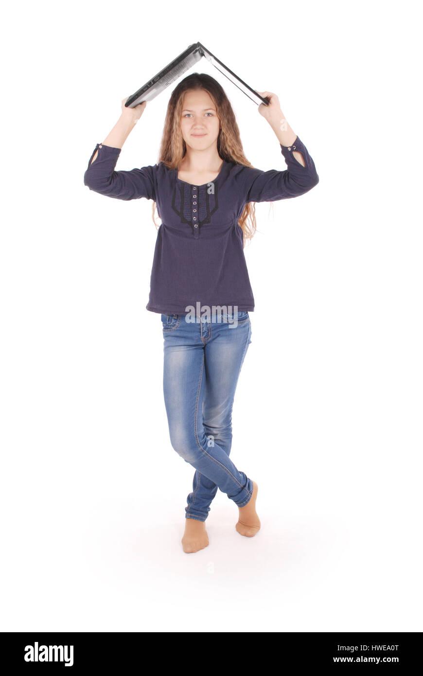 Smiling student teenage girl with laptop isolated on white Stock Photo ...