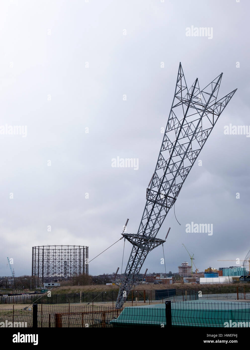 Inverted pylon - installation art by Alex Chinneck, North Greenwich Peninsula, London Stock Photo