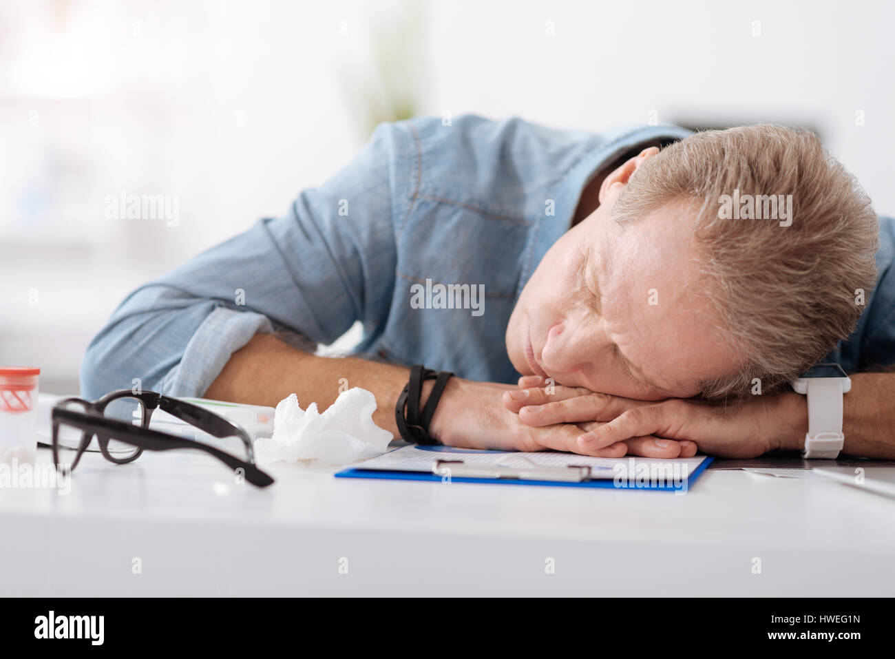 Worn Out Person Sleeping At Workplace Stock Photo 136158897 Alamy