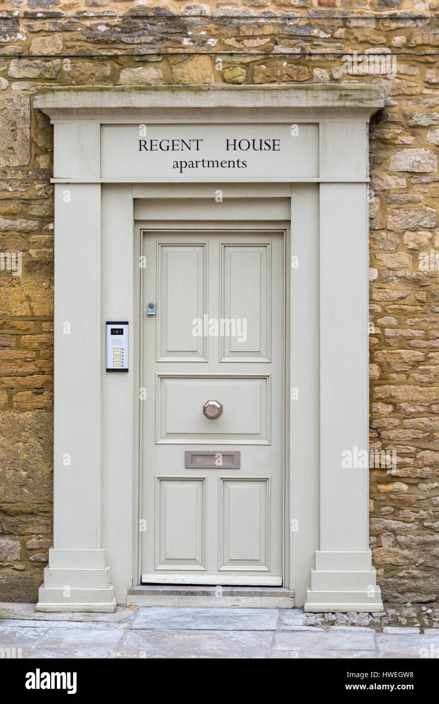 Cirencester - regency style doorway to Regent House apartments at West Market Place, Cirencester, Gloucestershire in March Stock Photo