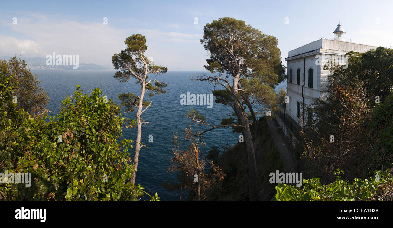 Punta Faro, Cape Lighthouse, Italy: panoramic view of the historic  Portofino Lighthouse, built in 1870 and located 40 meters above the sea level Stock Photo