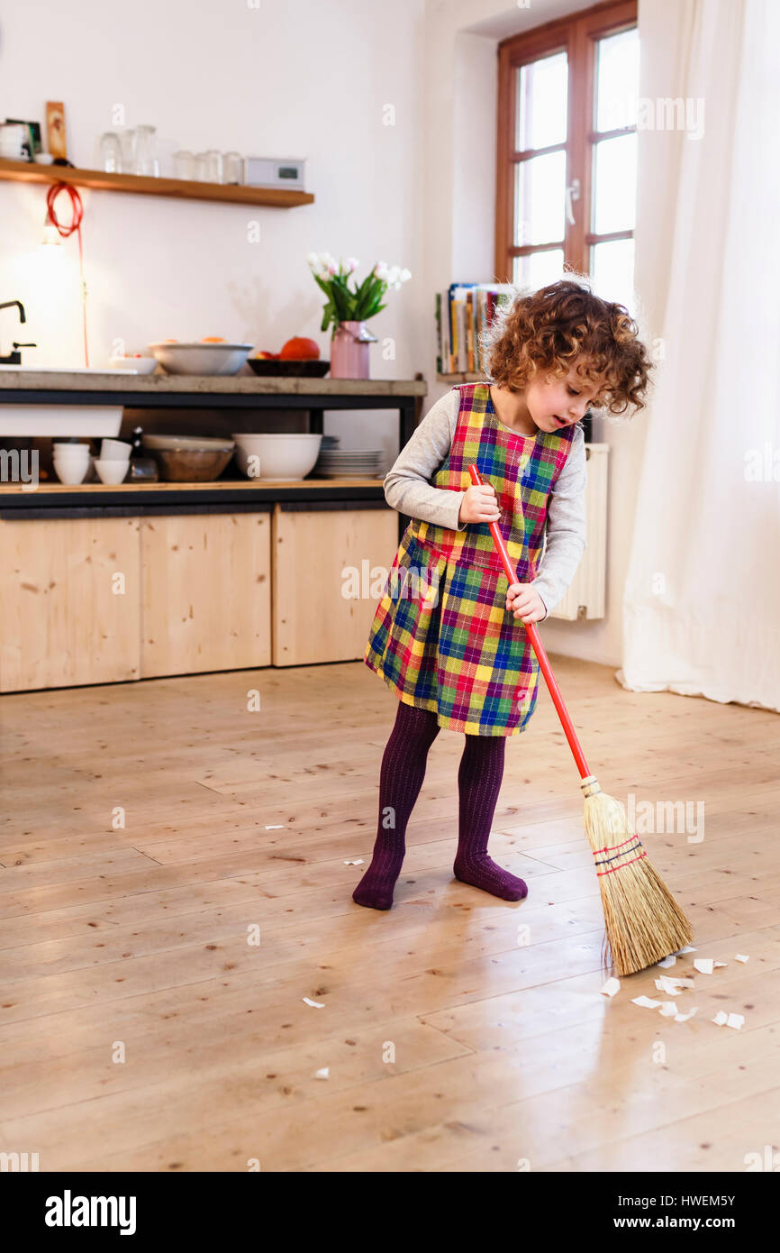 Cute Girl Sweeping Kitchen Floor Stock Photo 136162151 Alamy