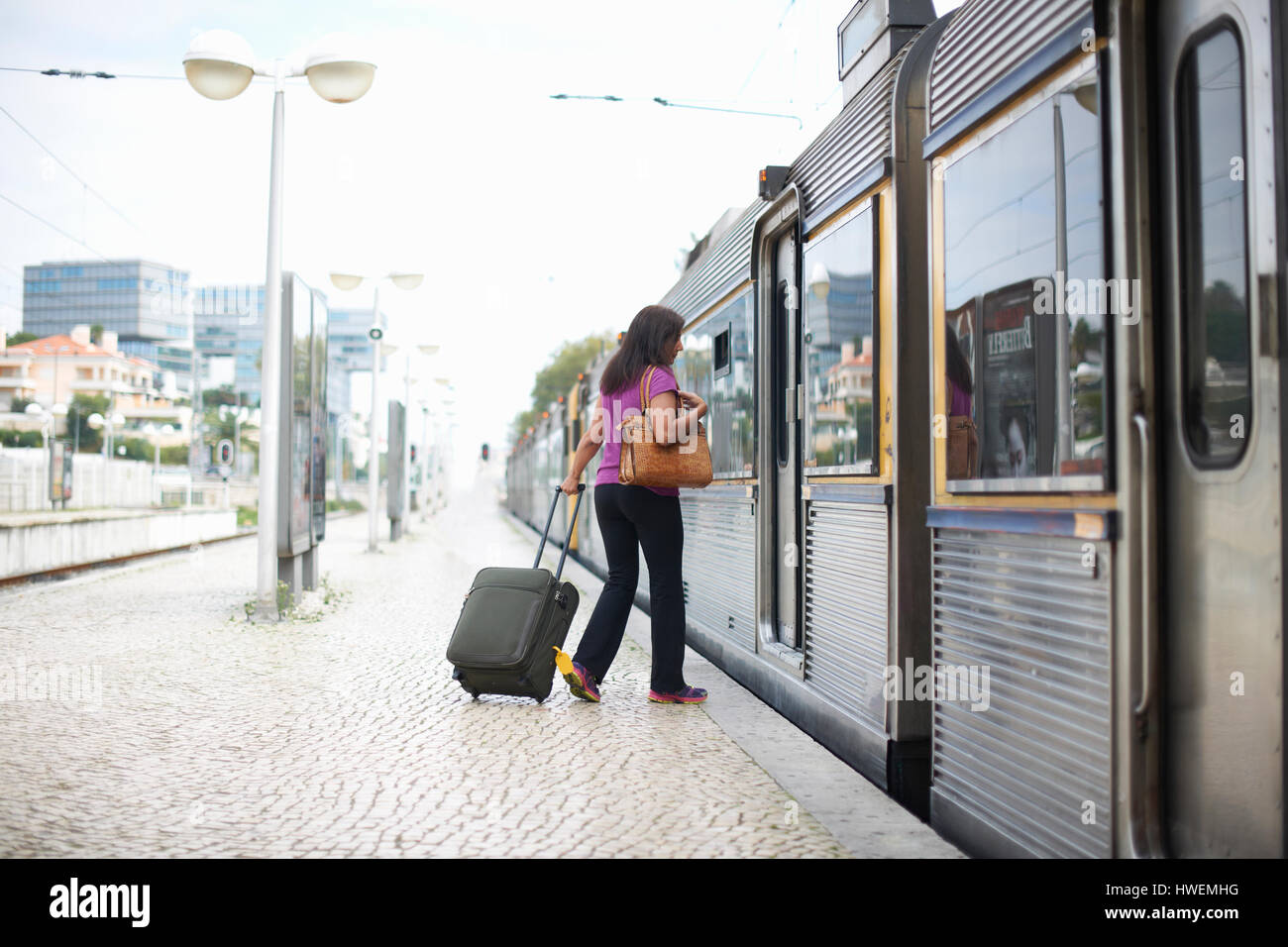 Mature woman on train station hi-res stock photography and images - Alamy