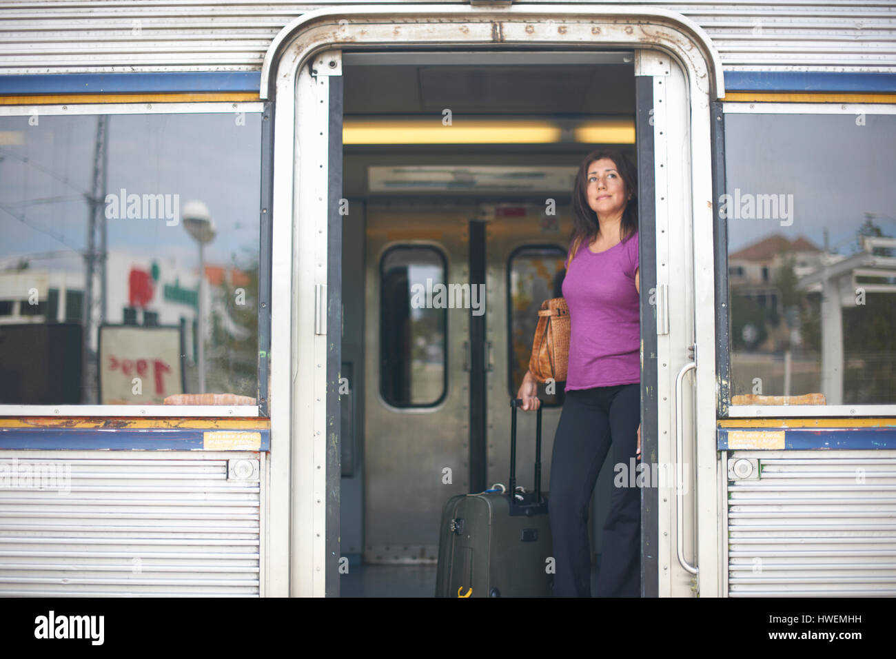 Mature woman on train station hi-res stock photography and images - Alamy