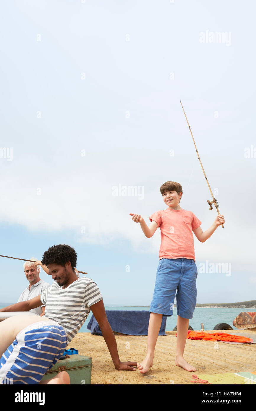 Family fishing on houseboat deck, Kraalbaai, South Africa Stock Photo