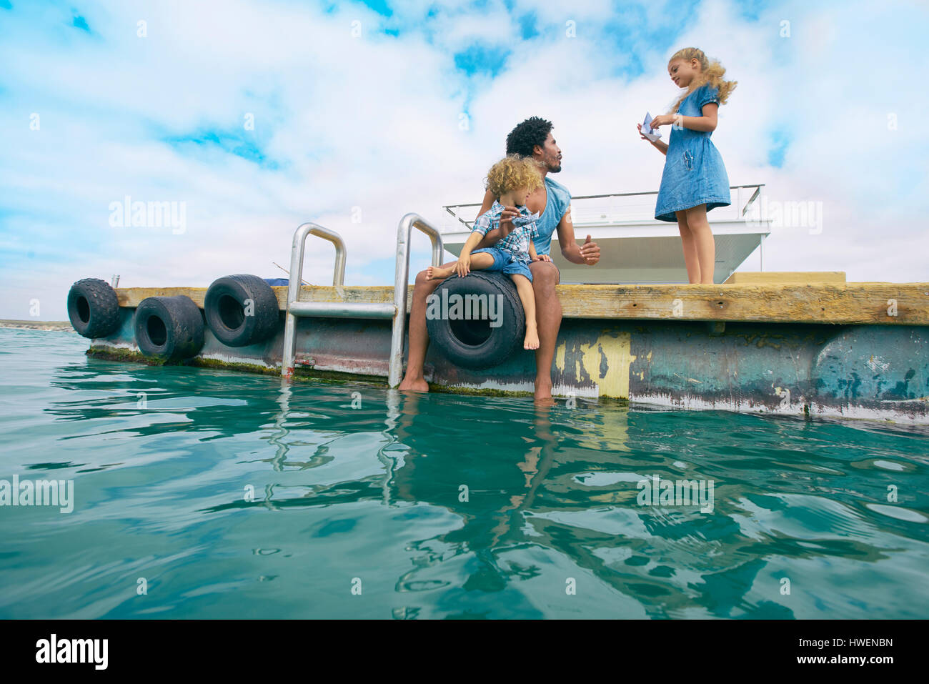 Family relaxing on houseboat sun deck, Kraalbaai, South Africa Stock Photo