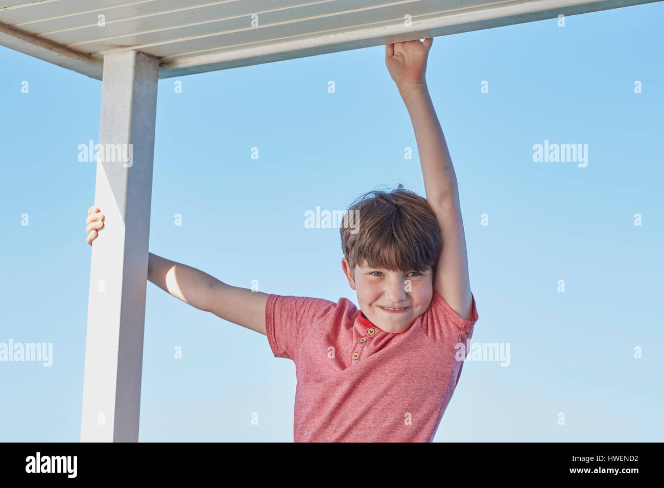Portrait of boy looking at camera smiling Stock Photo - Alamy