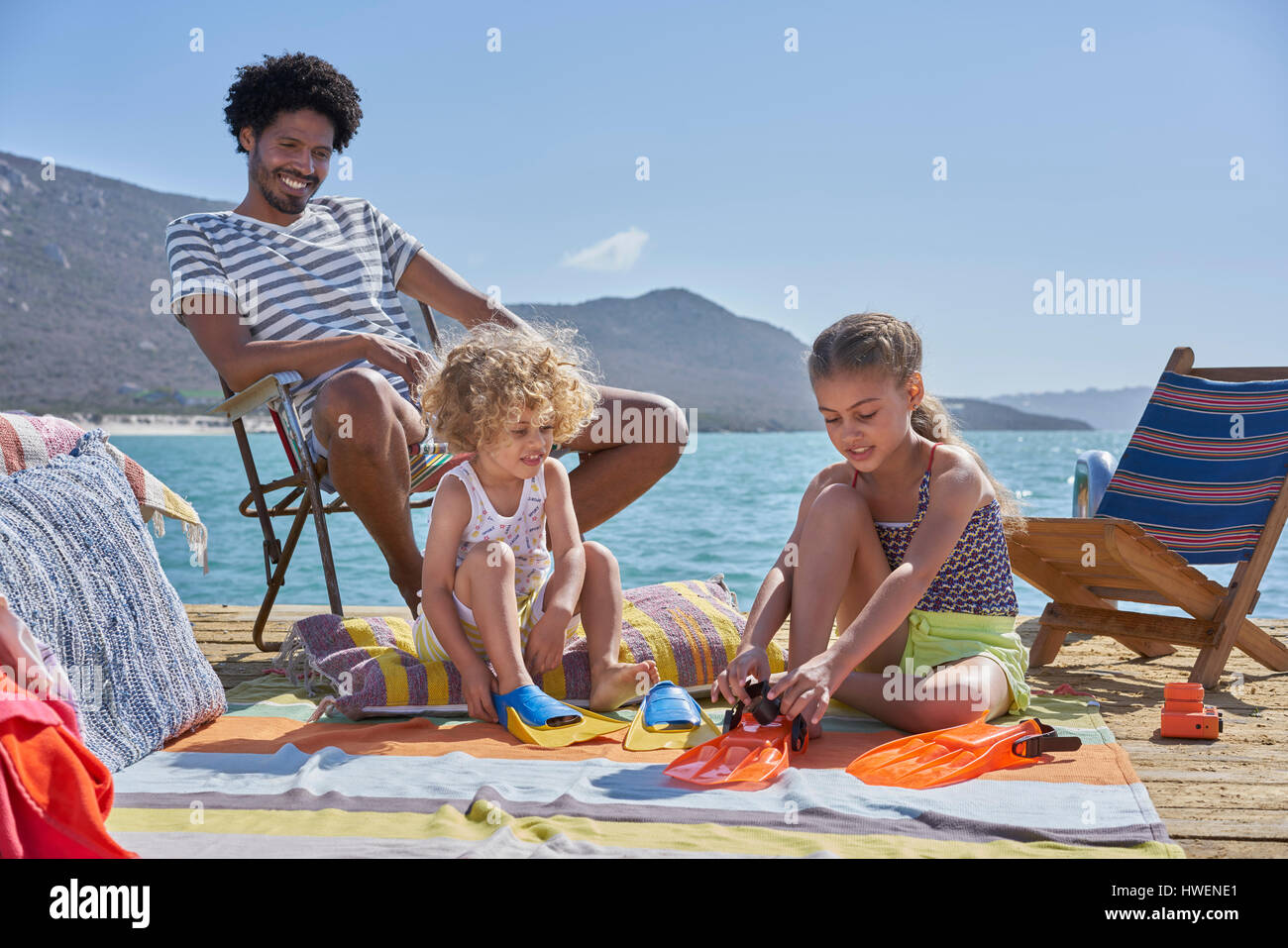 Family on houseboat deck, Kraalbaai, South Africa Stock Photo