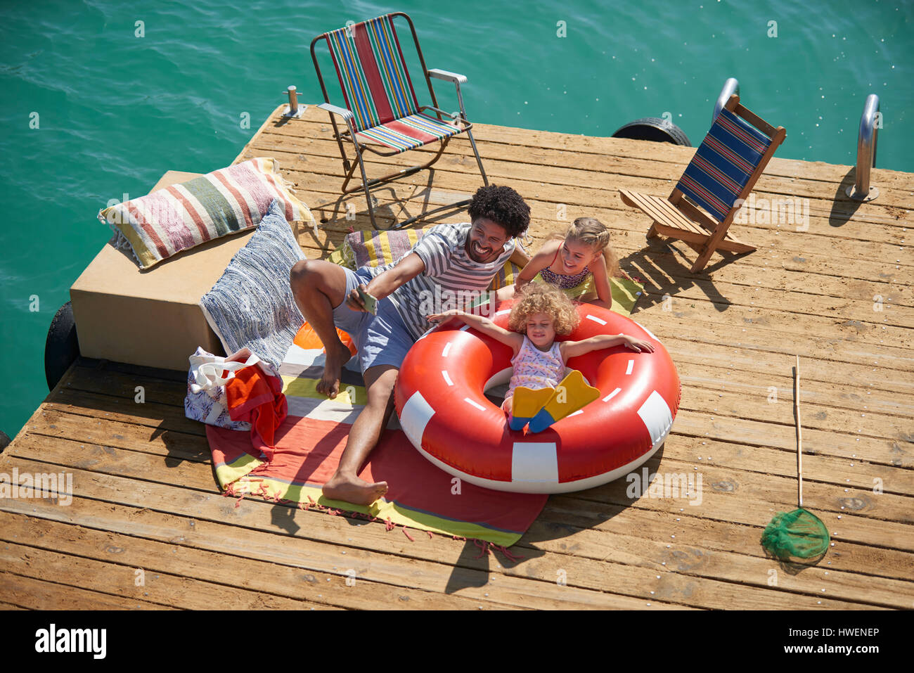 Family taking selfie on houseboat deck, Kraalbaai, South Africa Stock Photo