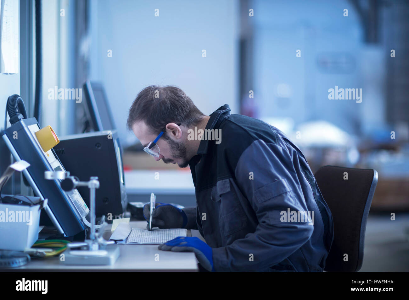 Young technician drawing engineering hires stock photography and