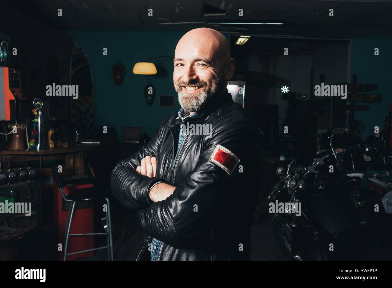 Portrait of mature man, in garage Stock Photo