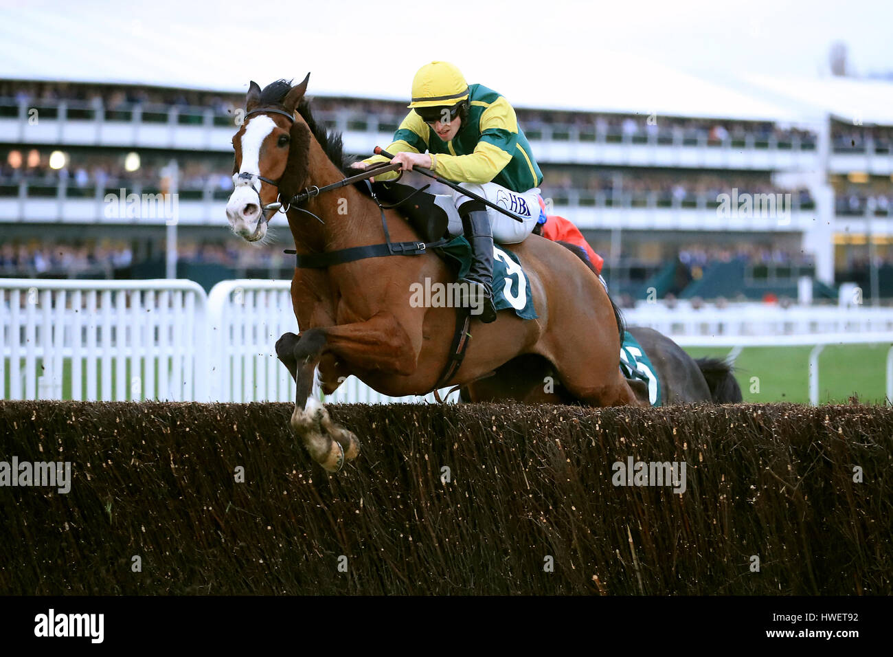 Jockey N George on Forgotten Gold during the Fulke Walwyn Kim Muir Challenge Cup Amateur Riders' Handicap Chase Stock Photo