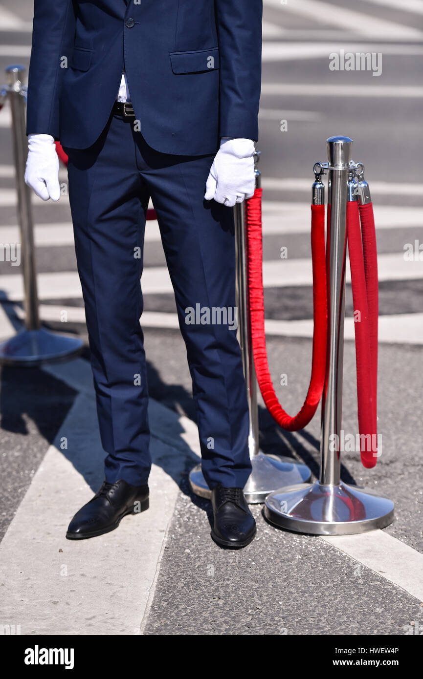 Detail with man in suit and white gloves at a reception Stock Photo Alamy