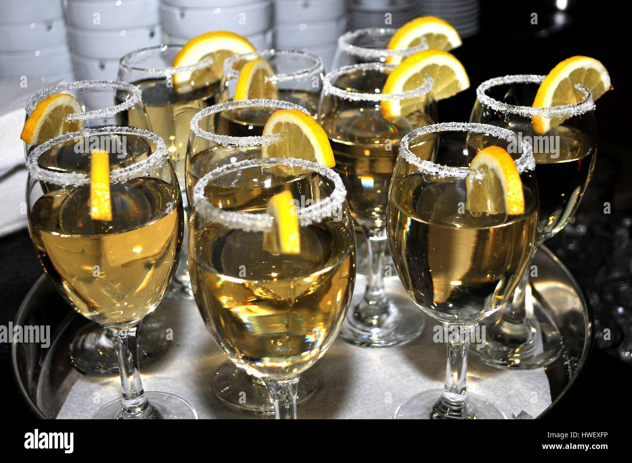 Focused glass of vermouth with a slice of lemon, thinly lined top of the glass with a layer of sweet sugar in the restaurant, Novi Sad, Serbia Stock Photo