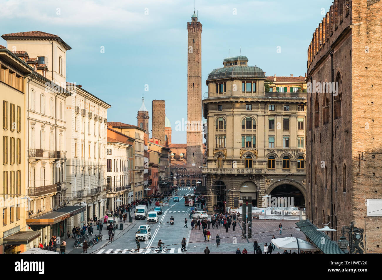 Bologna, Italy 27 frbruary 2017. Via RIzzoli, main street of Bologna city, in a winter afternoon: The Two Towers on bakground Stock Photo