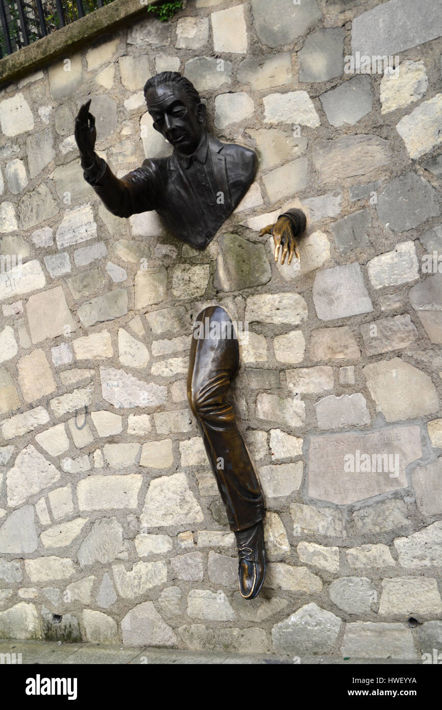 Sculpture called Le Passe-Muraille in Paris, France Stock Photo