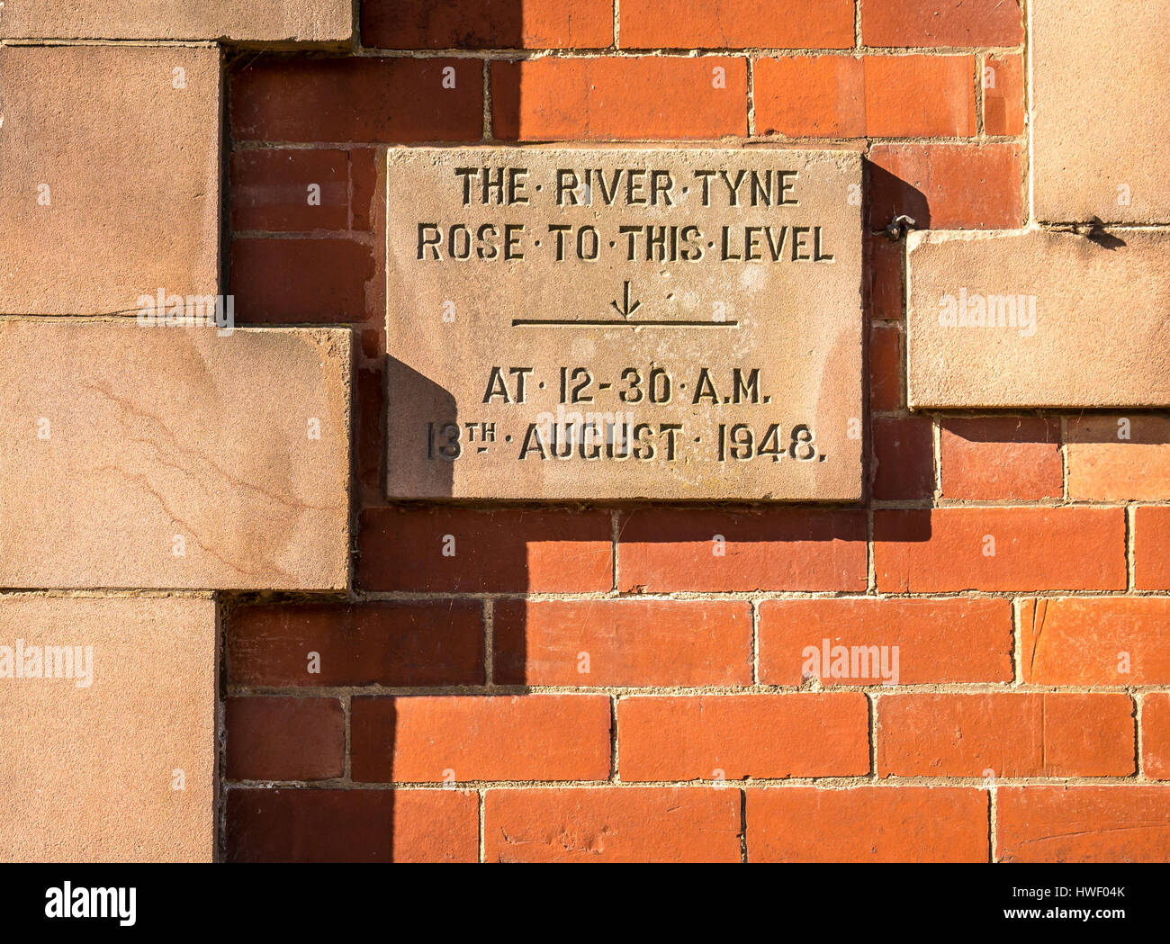 Inscription on wall indicating flood level,  River Tyne, 1948, Haddington, East Lothian, Scotland, UK Stock Photo
