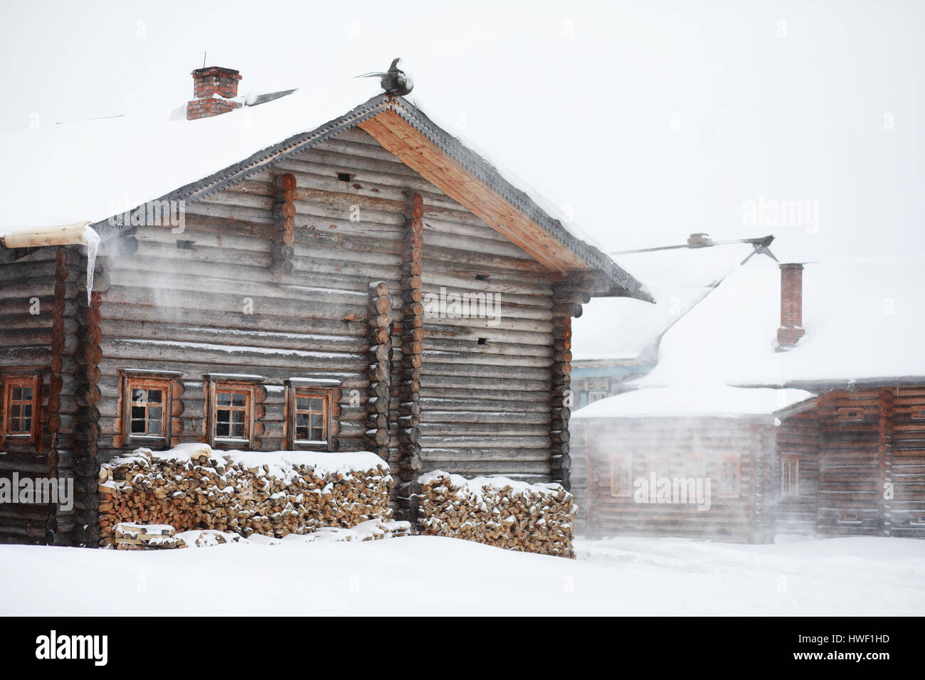 retro wooden house in the forest in russian north Stock Photo - Alamy