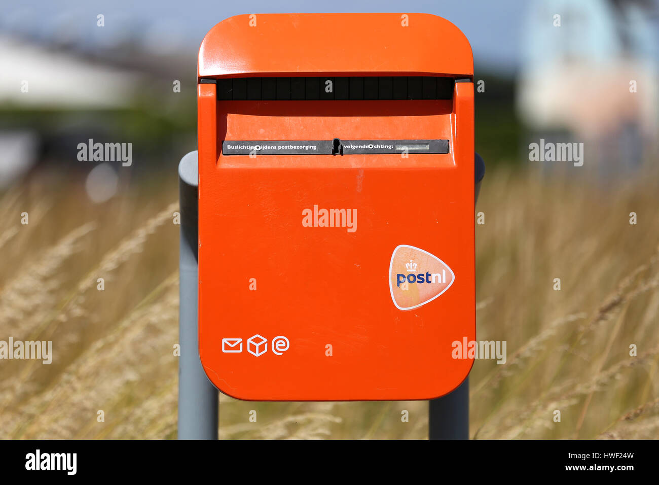 PostNL Mailbox. PostNL is a Dutch mail, parcel and e-commerce corporation and listed at Euronext Amsterdam. Stock Photo