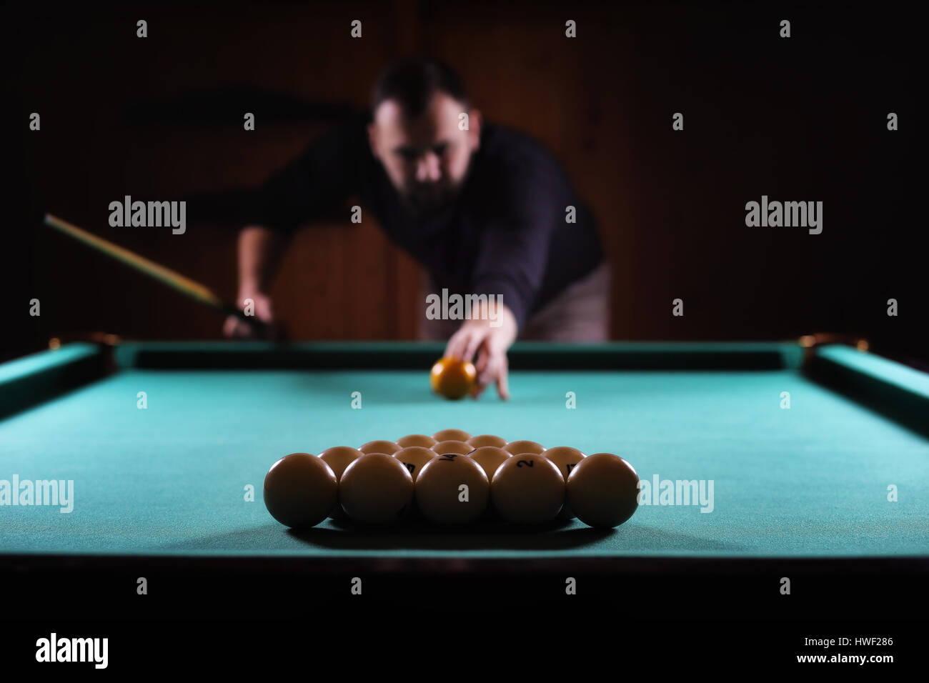 hansome man playing billiards alone Stock Photo Alamy