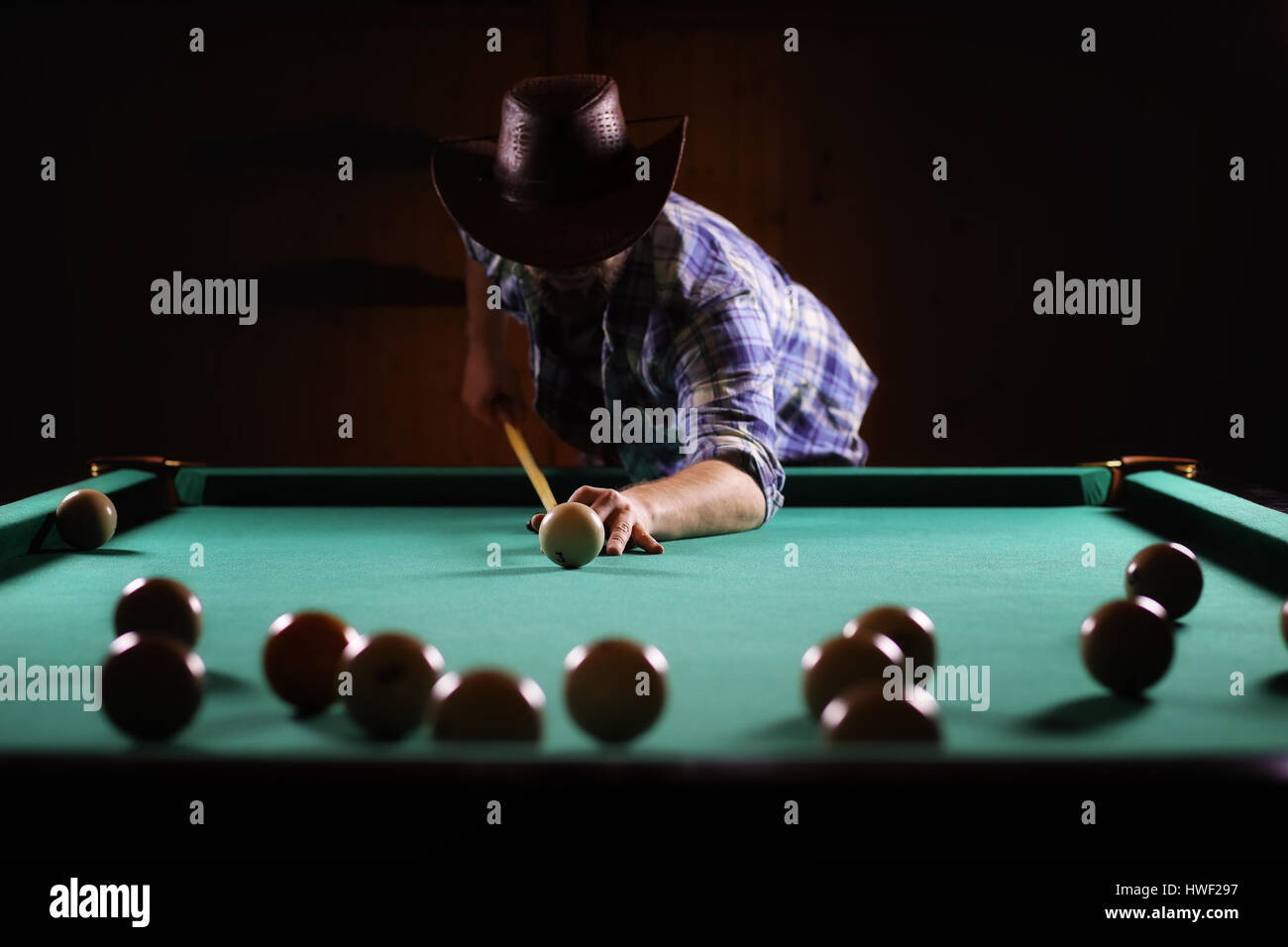 hansome man playing billiards alone Stock Photo Alamy