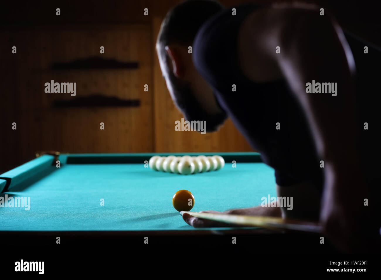 hansome man playing billiards alone Stock Photo Alamy