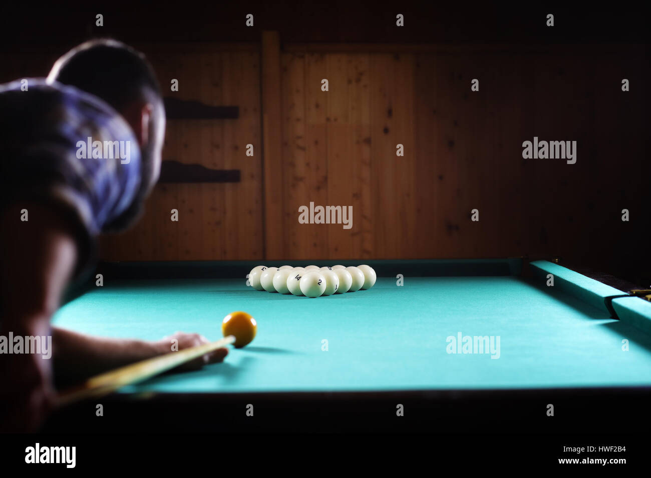 hansome man playing billiards alone Stock Photo Alamy