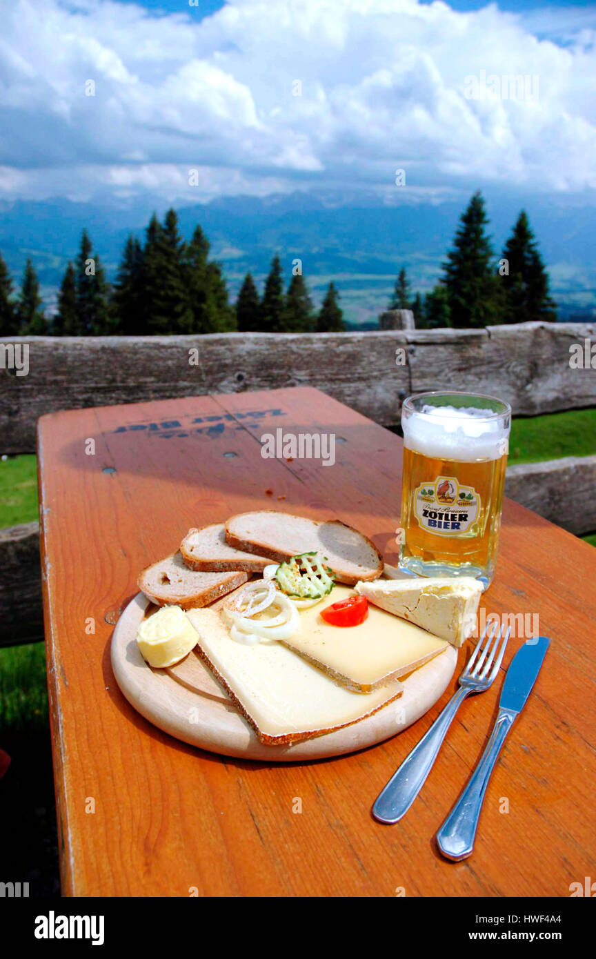 Lunch on a mountain hut, Mittagberg, Allgäuer Alpen, Upper Bavaria, Germany Stock Photo