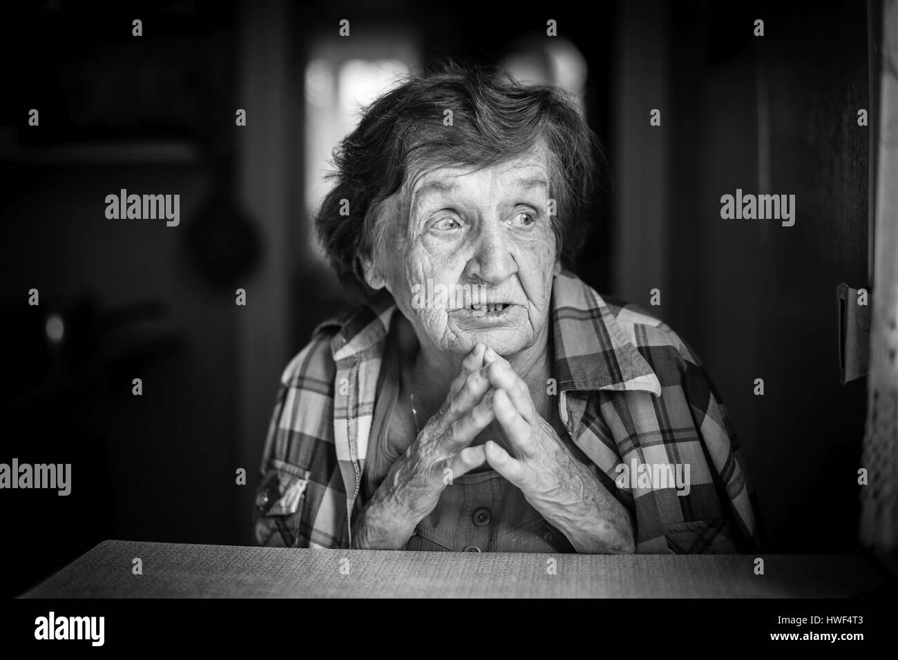 Emotional portrait of an elderly woman. Black and white photo Stock ...