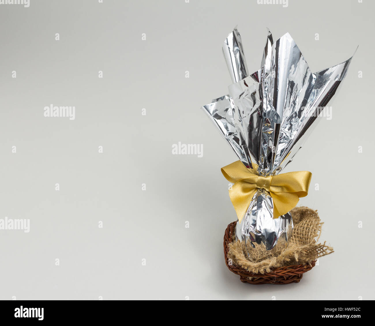 Pretty little easter egg made of chocolate. brazilian tradition to offer chocolate eggs Stock