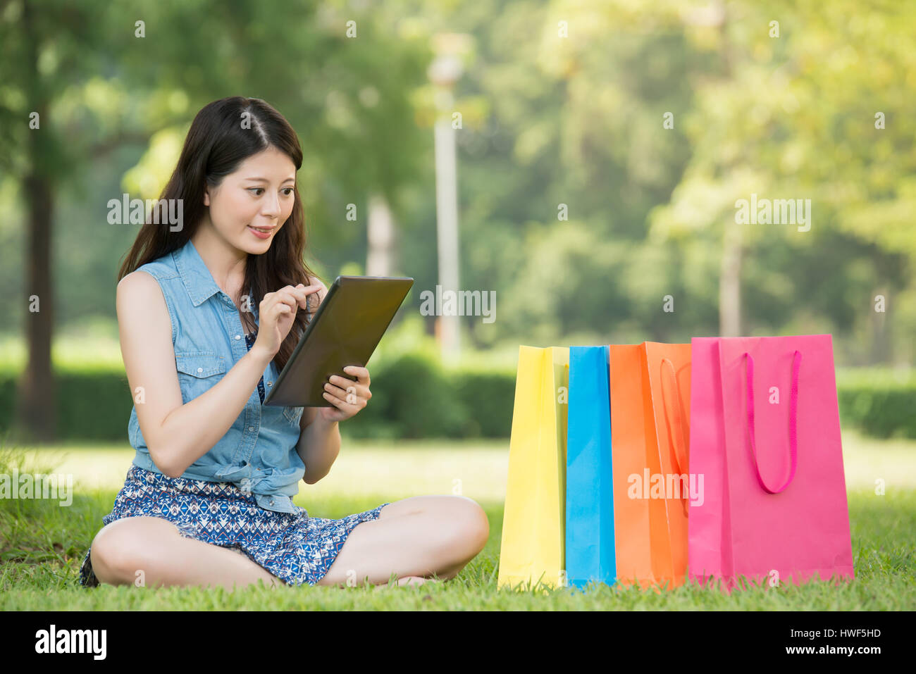 beautiful asian woman using digital tablet shopping online sitting on ...