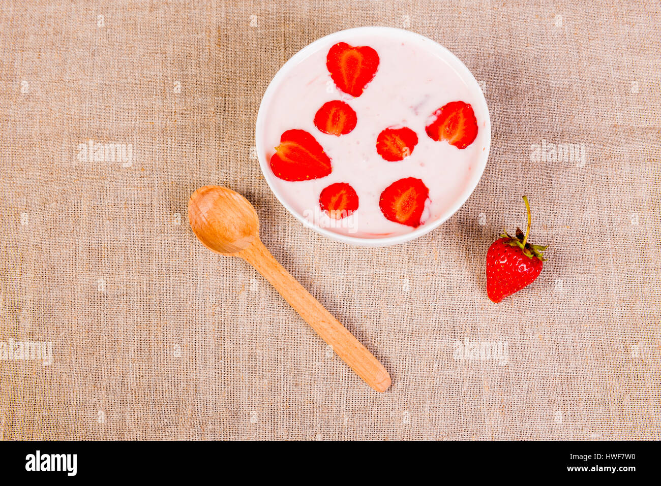 summer fresh red strawberry and yogurt on textile background Stock ...