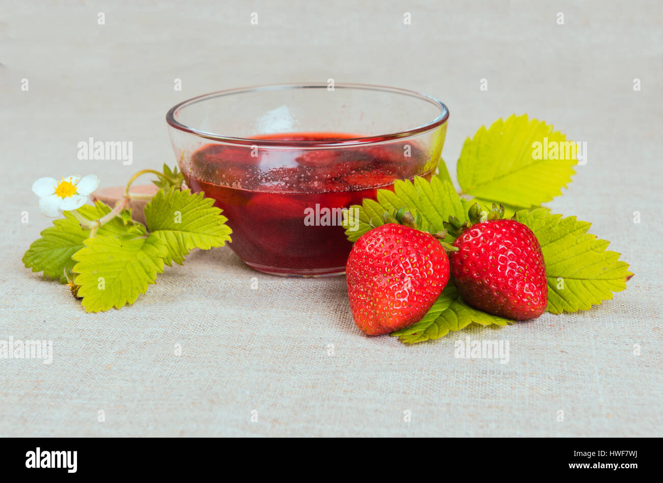 summer fresh red strawberry and jam on textile background Stock Photo ...