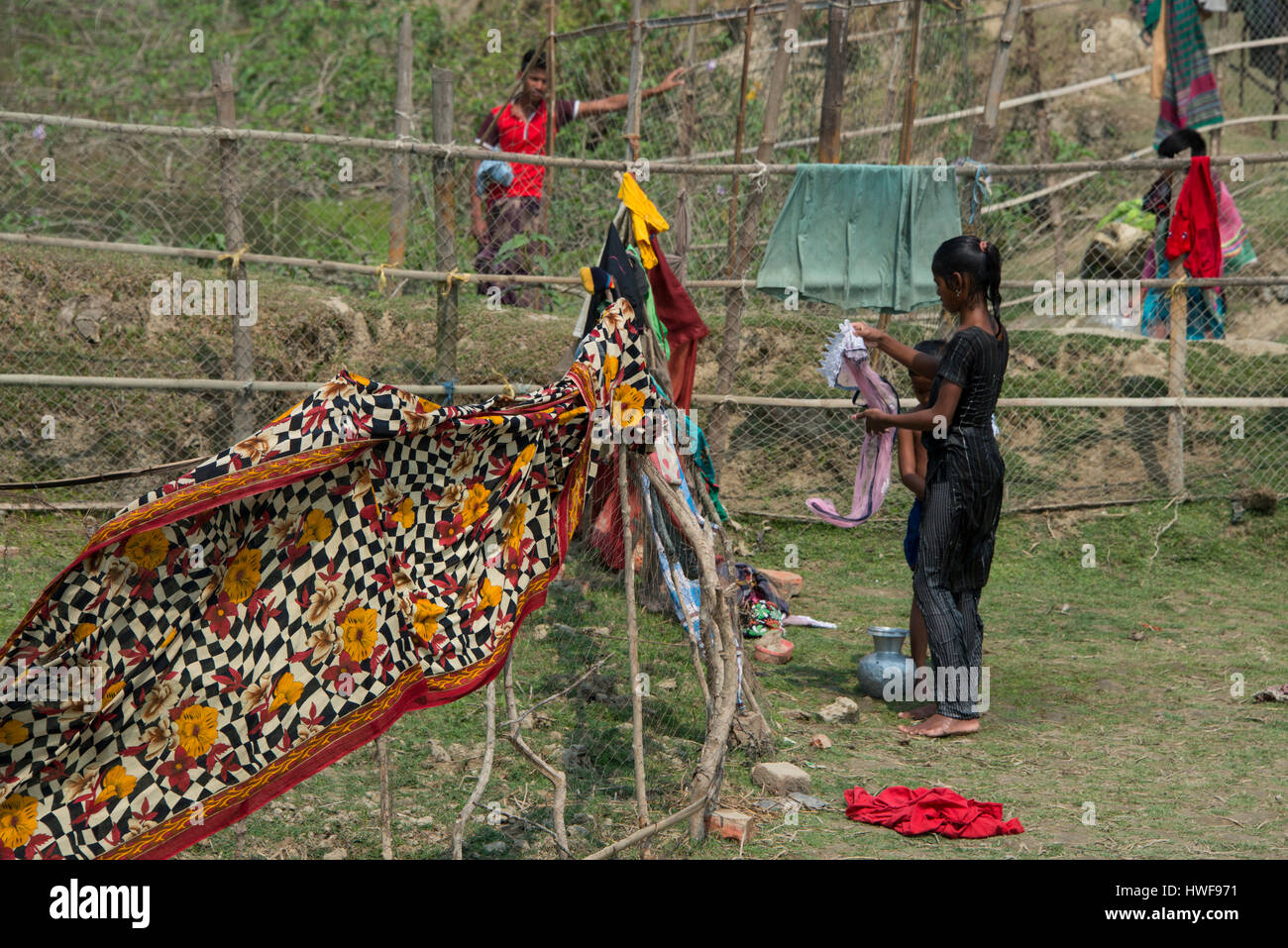 Bangladesh, Chittagong, District of Cox Bazar, Maheshkhali Island (aka Maheshkali, Mahesh Khali, Moheshkhali) Maheshkhali Village, hanging laundry. Stock Photo
