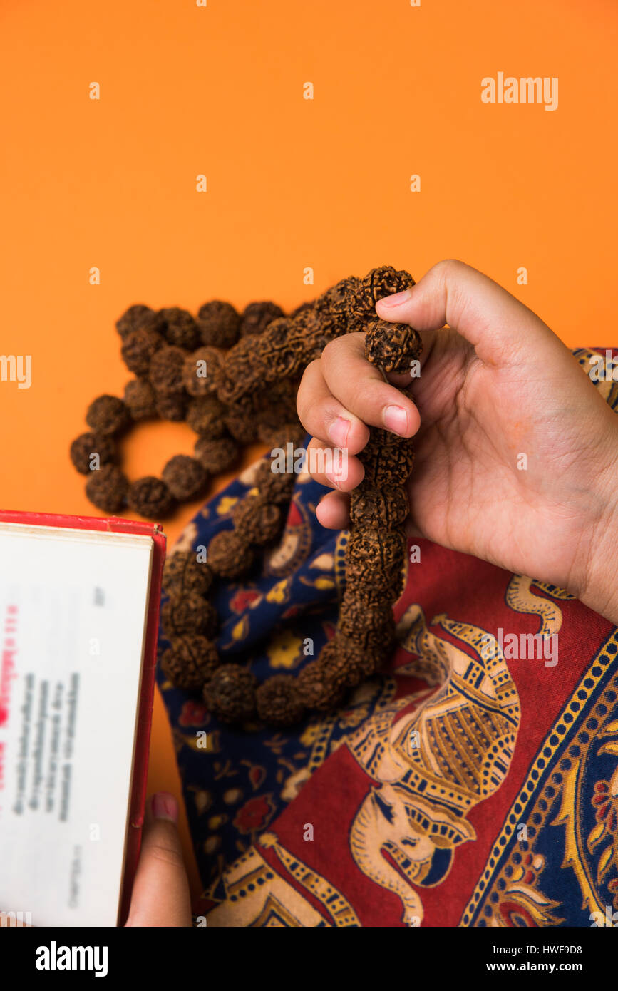 Rudraksha Rosary In A Female Hand. Japa Mala Stock Photo, Picture and  Royalty Free Image. Image 42922814.