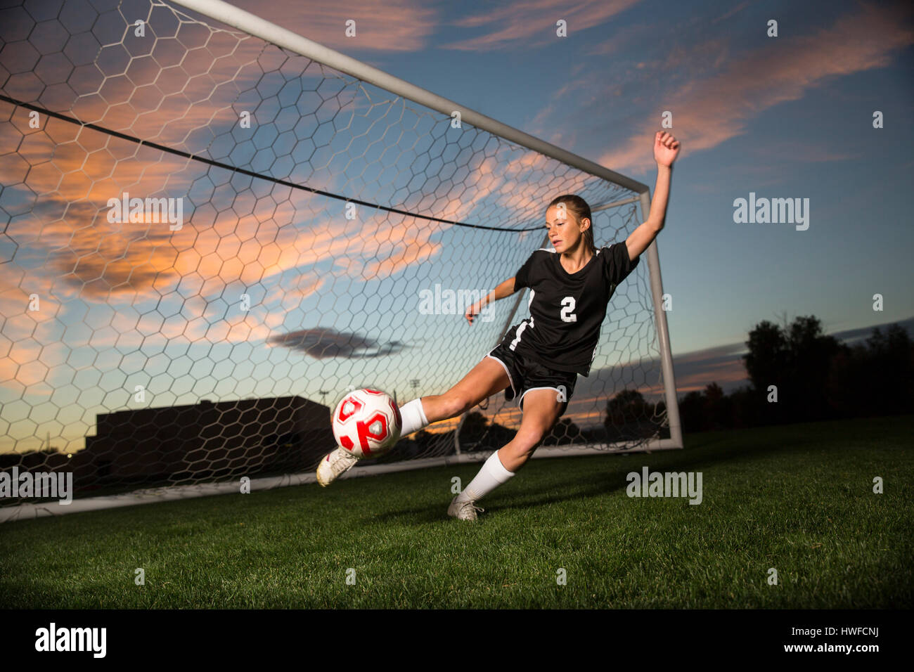 Kicking soccer ball hires stock photography and images Alamy