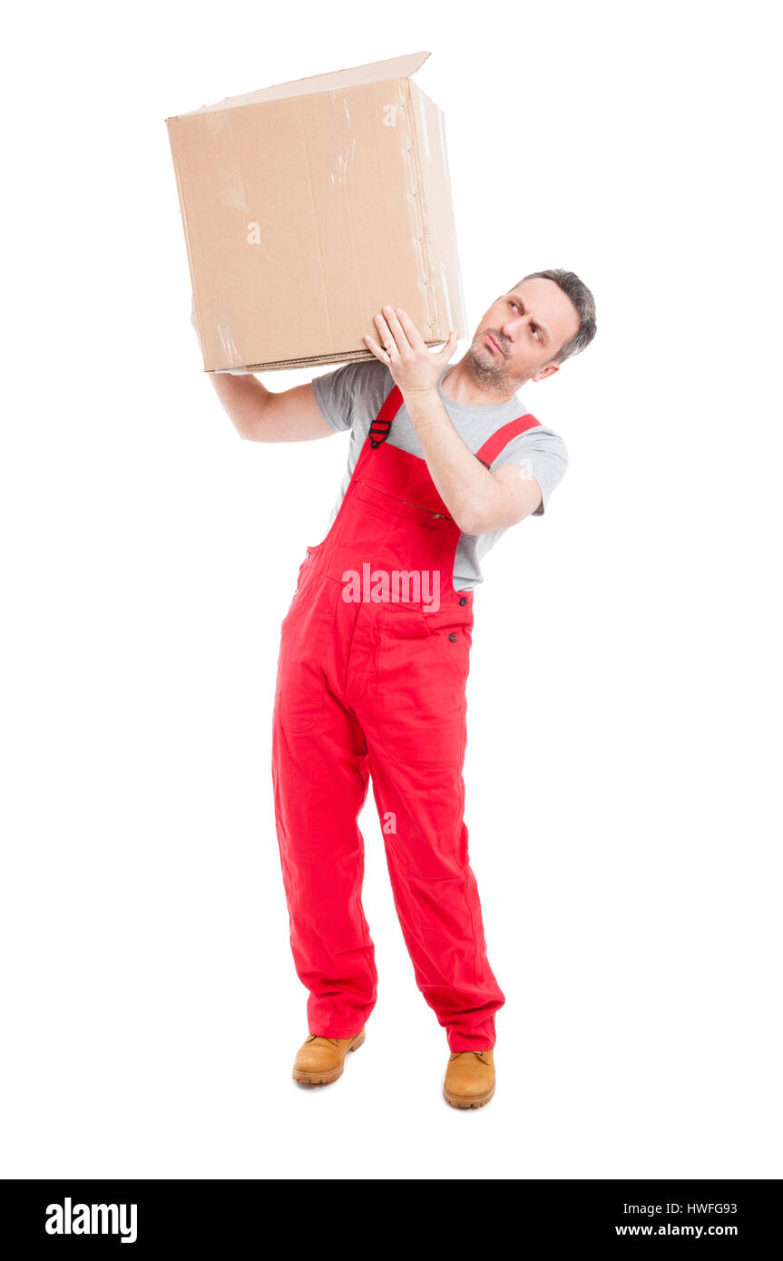 Full body of delivery guy carrying big cardboard box like moving concept isolated on white background Stock Photo