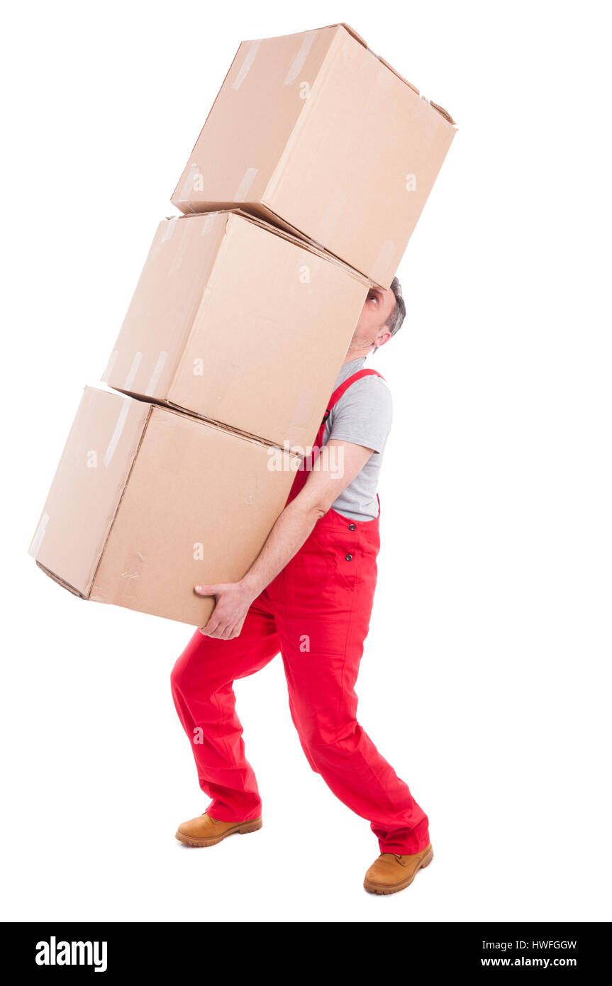Full body of guy lifting or holding bunch of heavy cardboard boxes isolated on white background Stock Photo