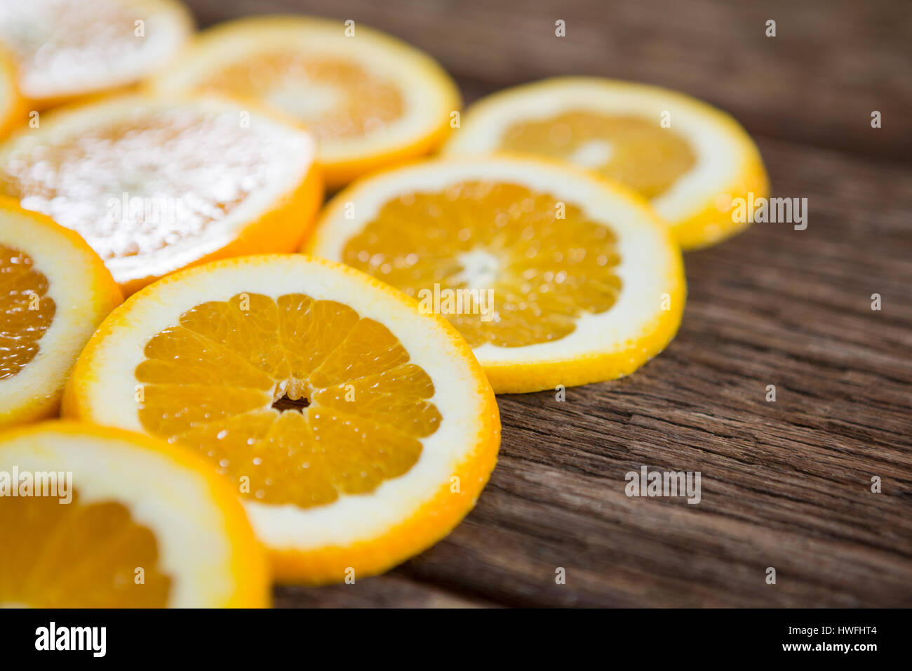 Orange slices on wooden hi-res stock photography and images - Alamy