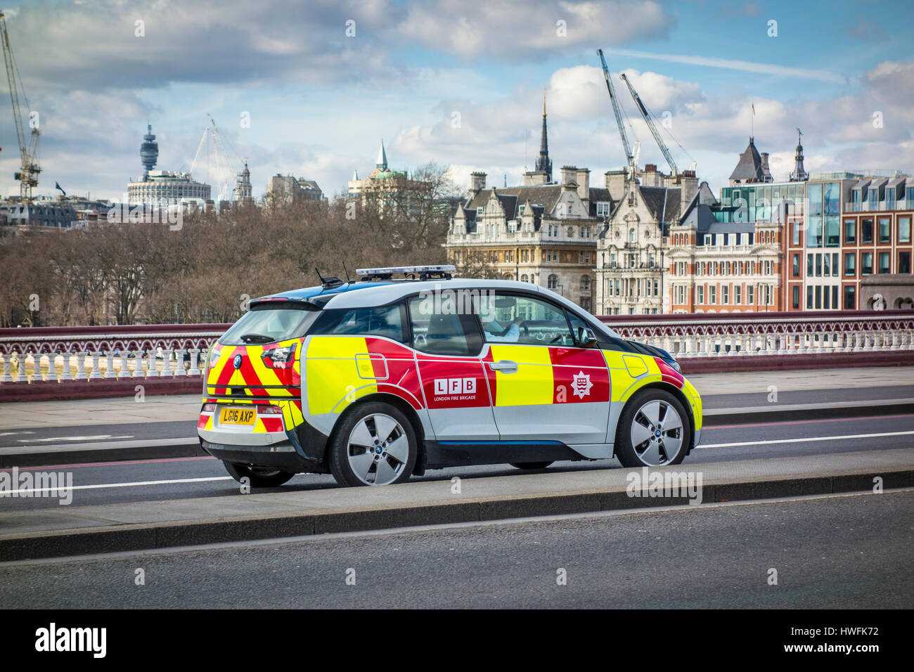 London Fire Brigade LFB electric car driving along Blackfriars Bridge, London, UK Stock Photo