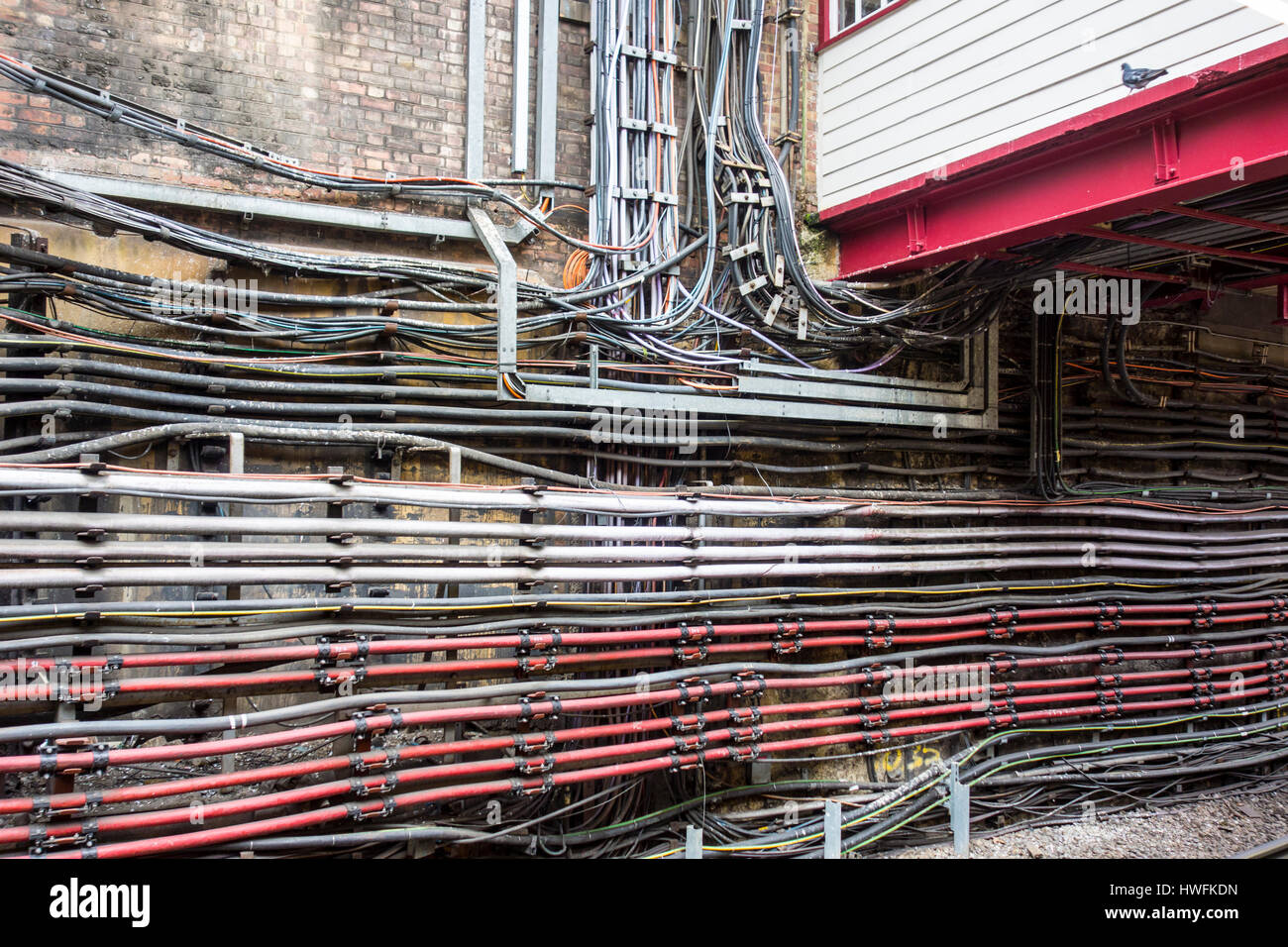 Cables on a station wall on the London Underground Stock Photo Alamy