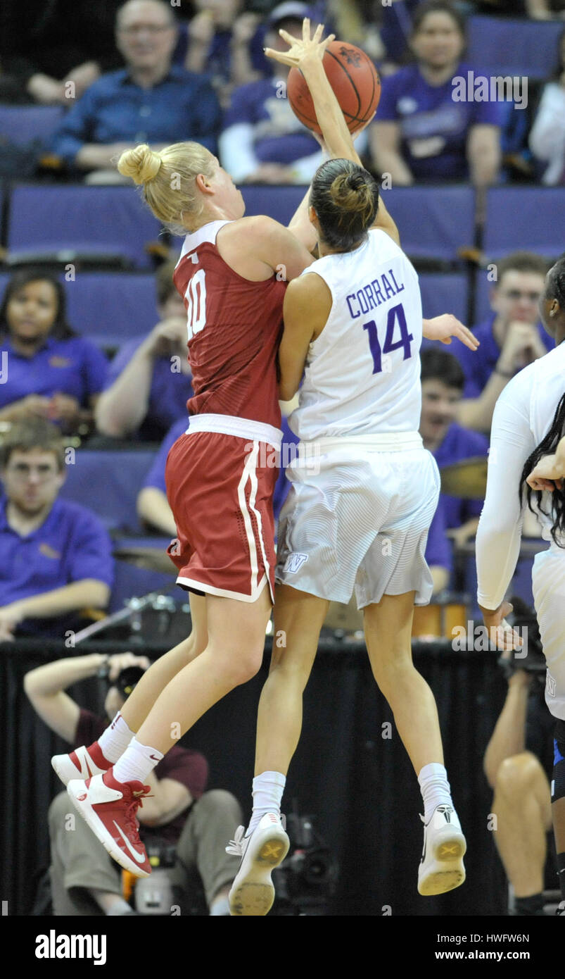 Seattle, WA, USA. 20th Mar, 2017. UW forward Heather Corral (14) blocks the shot of Oklahoma's Peyton Little (10) during a NCAA second round women's game between the Oklahoma Sooners and the Washington Huskies. UW won the game 108-82. The game was played at Hec Ed Pavilion on the University of Washington campus in Seattle, WA. Jeff Halstead/CSM/Alamy Live News Stock Photo