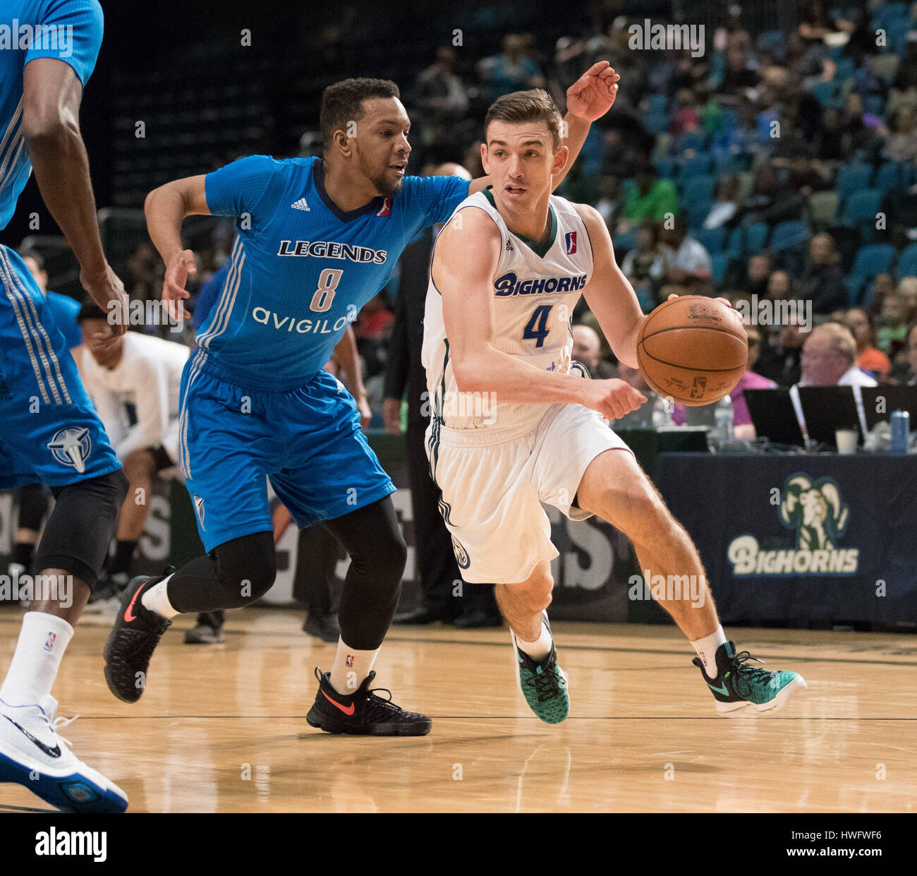 Reno, Nevada, USA. 20th Mar, 2017. Reno Bighorn Guard DAVID STOCKTON (4) drives against Texas Legends Guard BRYSON FONVILLE (8) during the NBA D-League Basketball game between the Reno Bighorns and the Texas Legends at the Reno Events Center in Reno, Nevada. Credit: Jeff Mulvihill/ZUMA Wire/Alamy Live News Stock Photo