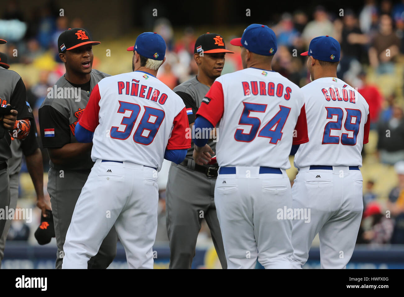 Los Angeles, CA, USA. 20th Mar, 2017. Players exchange caps before the game between the Netherlands and Puerto Rico, World Baseball Classic Semi-Finals, Dodger Stadium in Los Angeles, CA. Peter Joneleit /CSM/Alamy Live News Stock Photo