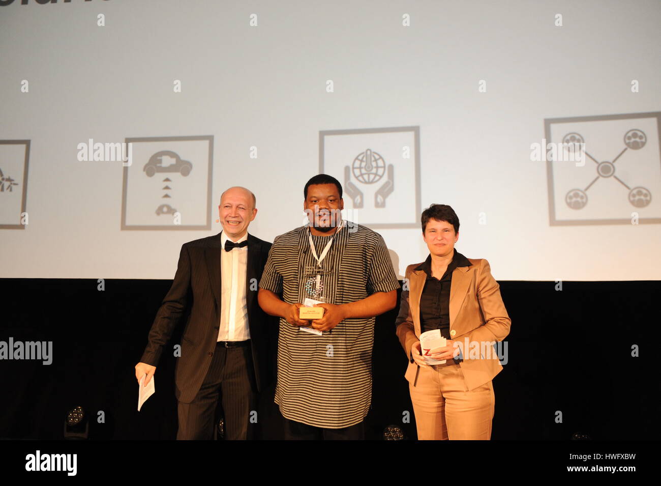 Berlin, Germany. 20th Mar, 2017. Cold Hubs from Nigeria is awarded as Special Prize category winner, a special award for projects that contribute to the seventh sustainable development goal (SDG 7) of the United Nations: affordable and clean energy for all, in Berlin, Germany, on March 20, 2017. The winners of first-ever international Start up Energy Transition Award sponsored by the German Energy Agency (DENA) were announced in Berlin on Monday. Awards in six categories were granted to start-ups from France, Germany, India, Bangladesh and Nigeria. Credit: Yan Feng/Xinhua/Alamy Live News Stock Photo
