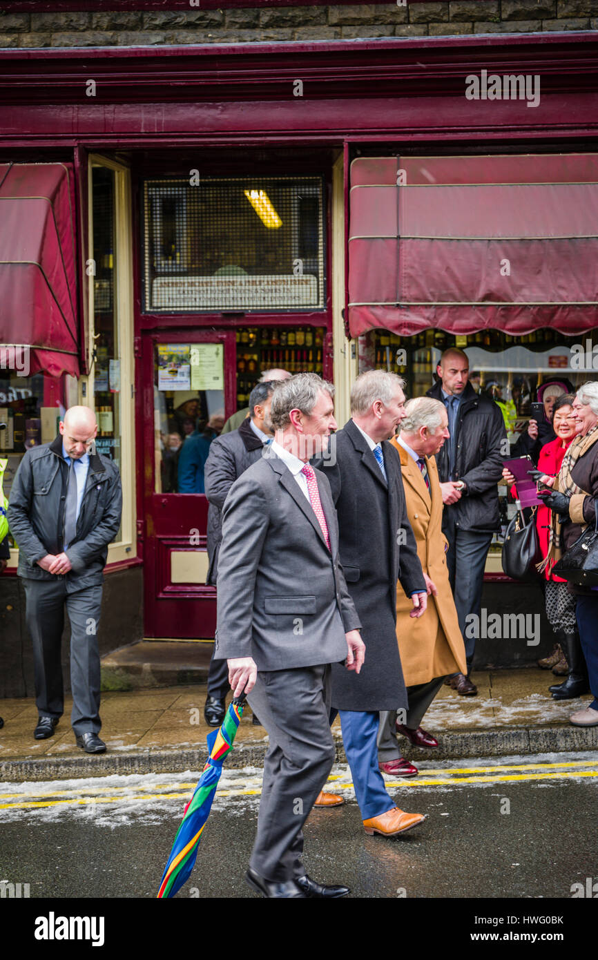 Clitheroe, UK. 21st Mar, 2017. Royal visit by HRH Prince Charles to Clitheroe to see local retailers that support the town's food festival - held later in the year. This image local residents meet the Prince despite the poor weather conditions, at Byrnes Wine Merchants. Credit: STEPHEN FLEMING/Alamy Live News Stock Photo
