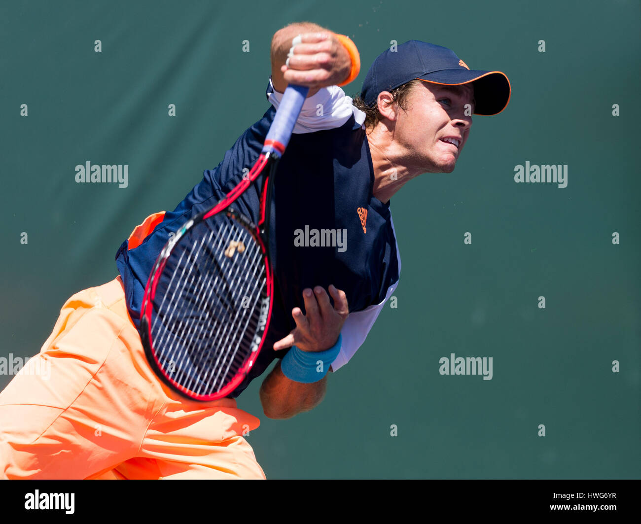 Key Biscayne, Florida, USA. 21st Mar, 2017. Christian Harrison, of the United States, serves against Rogerio Dutra Silva, from Brazil, at the 2017 Miami Open presented by Itau professional tennis tournament, played at Crandon Park Tennis Center in Key Biscayne, Florida, USA. Mario Houben/CSM/Alamy Live News Stock Photo
